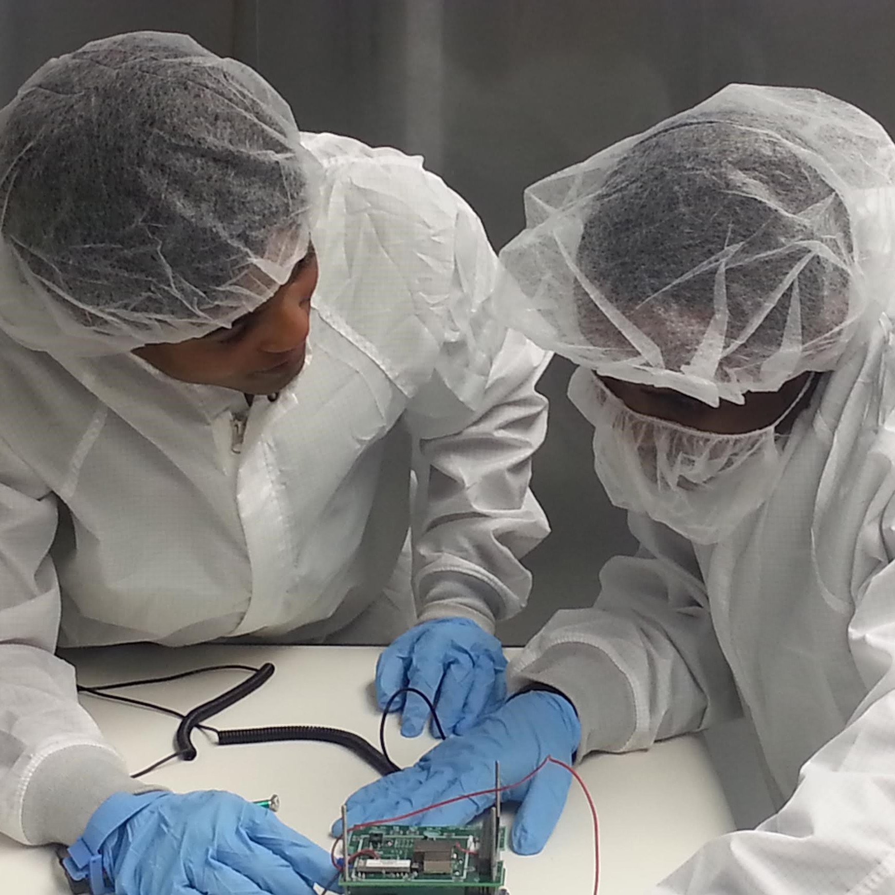 Medgar Evers College students work on CubeSat