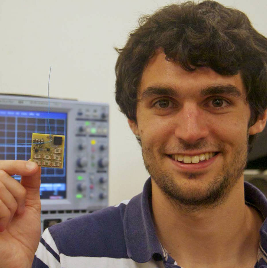 Zac Manchester, graduate researcher at Cornell University, holds a Sprite prototype