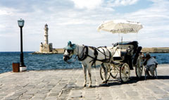 Chania: the lighthouse and tourist transport